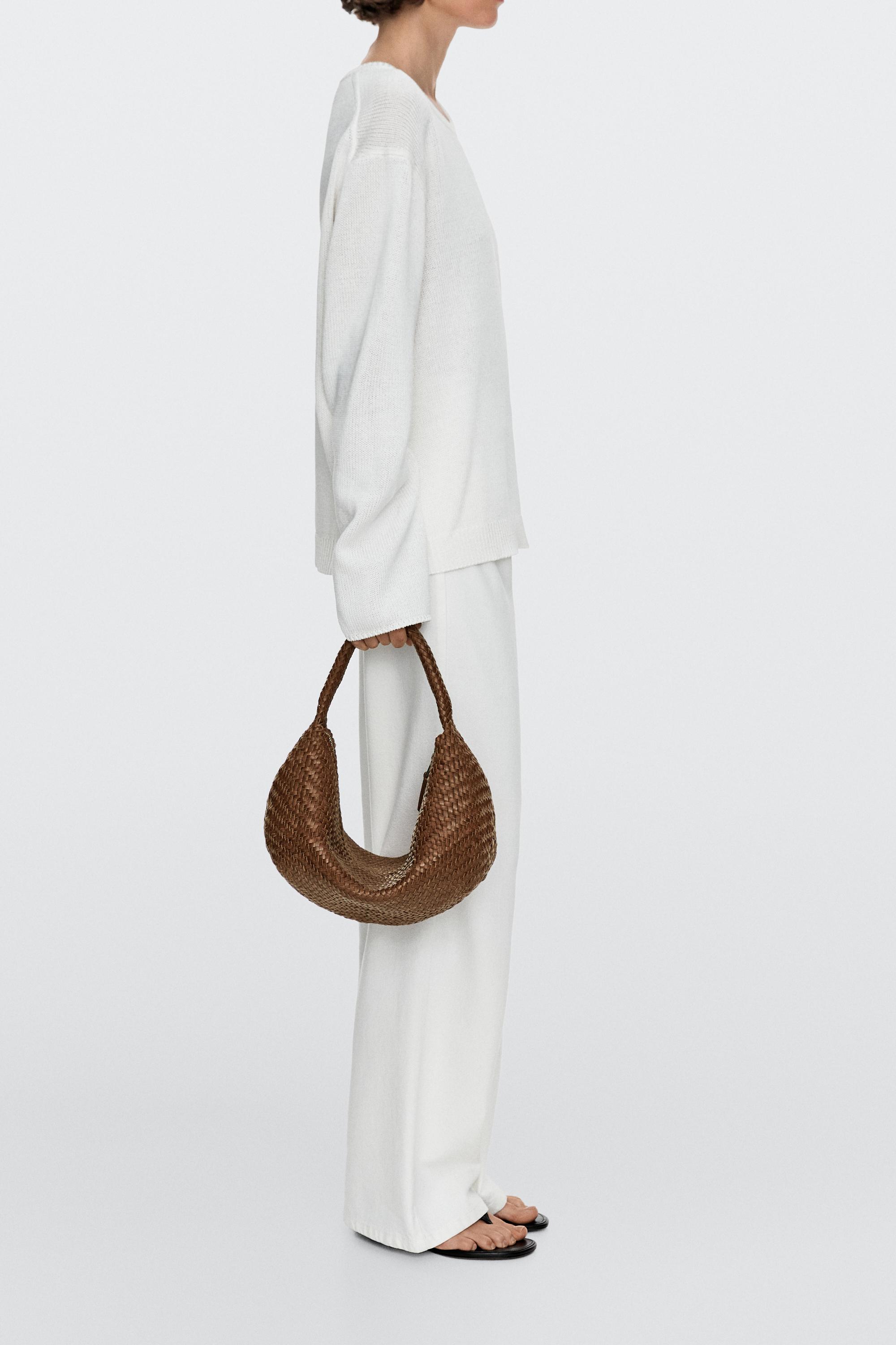 Sac demi-lune tressé cuir